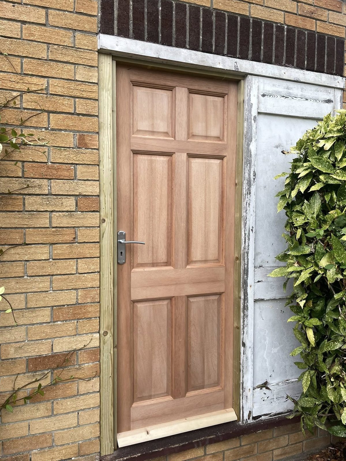 New timber side door after replacement